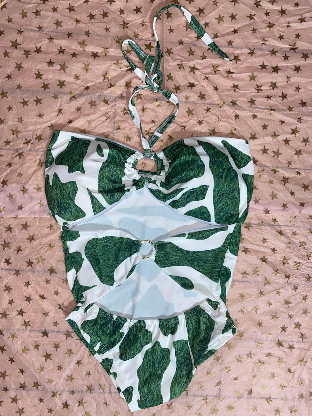 Green and white open one piece swimsuit